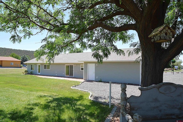 404 SE Birdie Cir, Cedaredge, CO 81413 - ranch-style house featuring a front yard