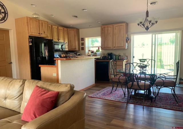 404 SE Birdie Cir, Cedaredge, CO 81413 - kitchen featuring black appliances, a chandelier, open floor plan, dark wood-style flooring, and decorative light fixtures