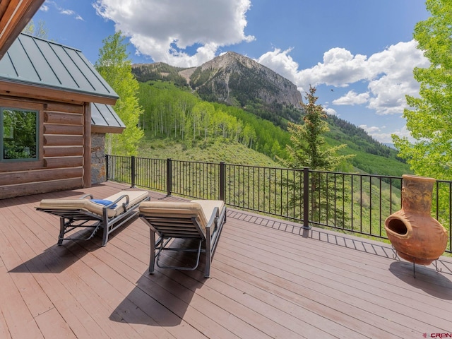 3 Summit Ct, Mount Crested Butte, CO 81225 - wooden deck with a mountain view and a wooded view