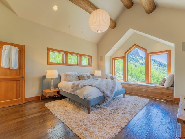3 Summit Ct, Mount Crested Butte, CO 81225 - bedroom featuring dark wood-style floors, beam ceiling, and high vaulted ceiling