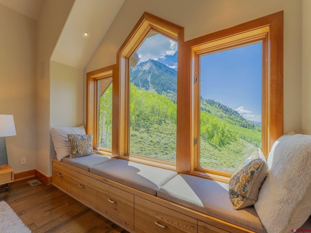 3 Summit Ct, Mount Crested Butte, CO 81225 - sitting room with a mountain view, dark wood-style flooring, plenty of natural light, vaulted ceiling, and recessed lighting