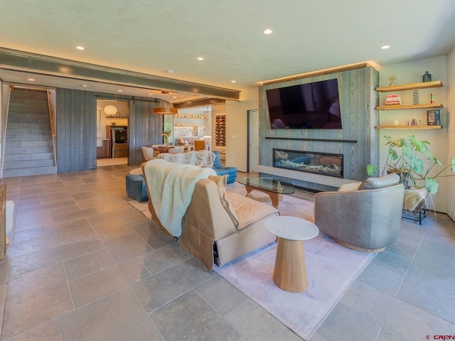3 Summit Ct, Mount Crested Butte, CO 81225 - living area featuring washer / clothes dryer, recessed lighting, and a large fireplace