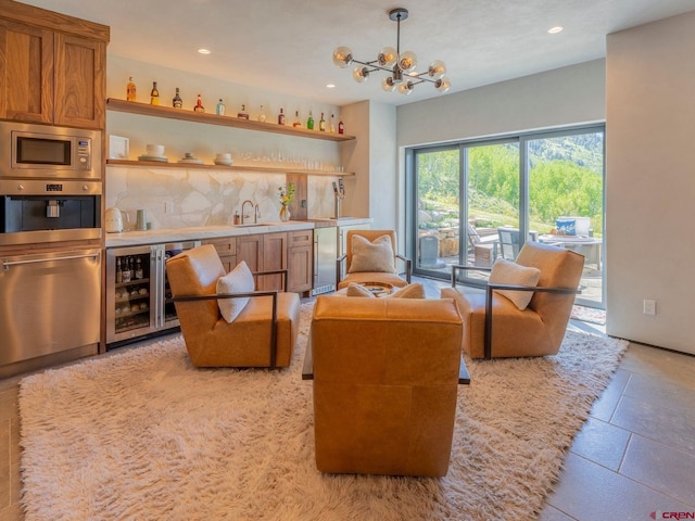 3 Summit Ct, Mount Crested Butte, CO 81225 - sitting room featuring wet bar, wine cooler, a chandelier, and recessed lighting