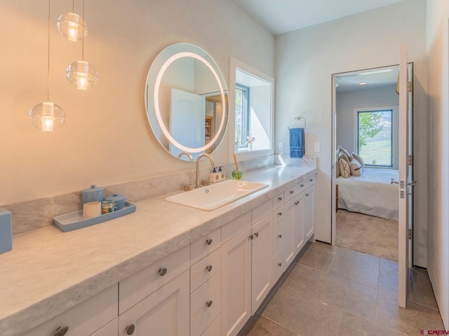 3 Summit Ct, Mount Crested Butte, CO 81225 - bathroom with vanity, tile patterned floors, and ensuite bathroom