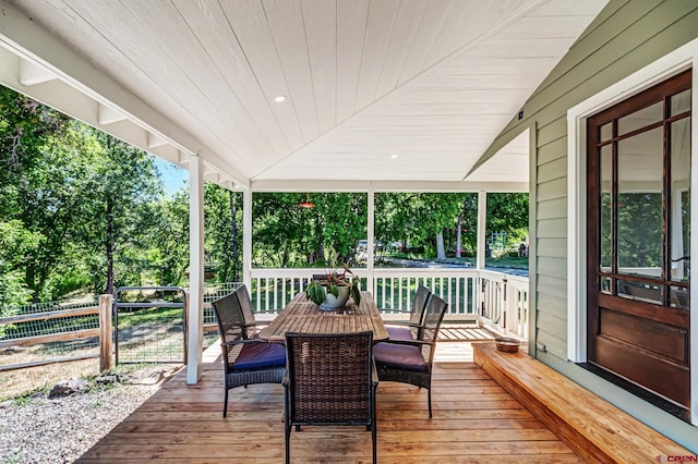 9359 49 1/4 Rd, Mesa, CO 81643 - deck featuring outdoor dining area and view of wooded area