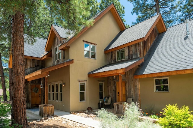 15 Edgemont Way, Durango, CO 81301 - back of house with a shingled roof and stucco siding