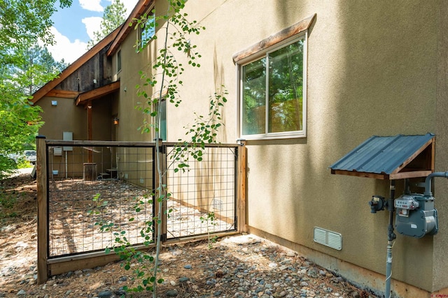 15 Edgemont Way, Durango, CO 81301 - view of property exterior featuring a gate and stucco siding