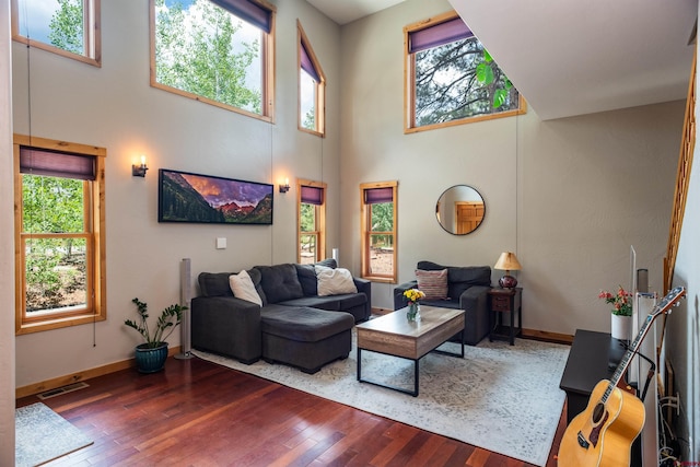 15 Edgemont Way, Durango, CO 81301 - living room with hardwood / wood-style flooring and a high ceiling