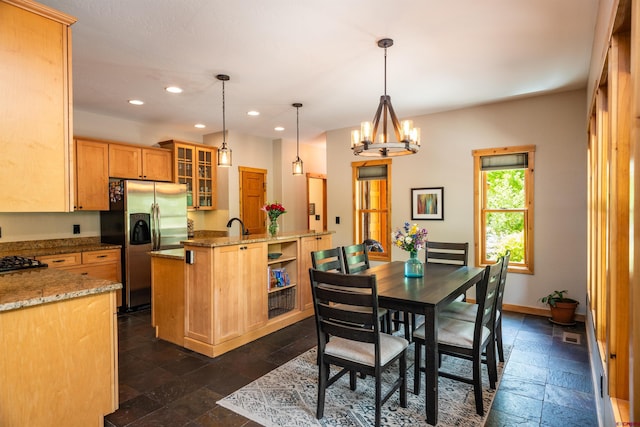 15 Edgemont Way, Durango, CO 81301 - dining room featuring stone tile floors, recessed lighting, and a chandelier