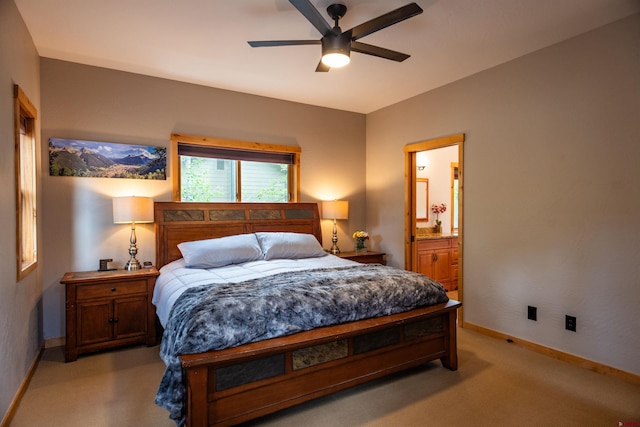 15 Edgemont Way, Durango, CO 81301 - bedroom with ensuite bathroom, light colored carpet, and ceiling fan
