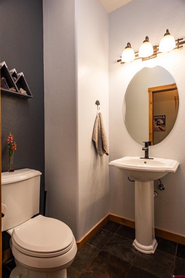 15 Edgemont Way, Durango, CO 81301 - half bathroom with toilet and tile patterned floors