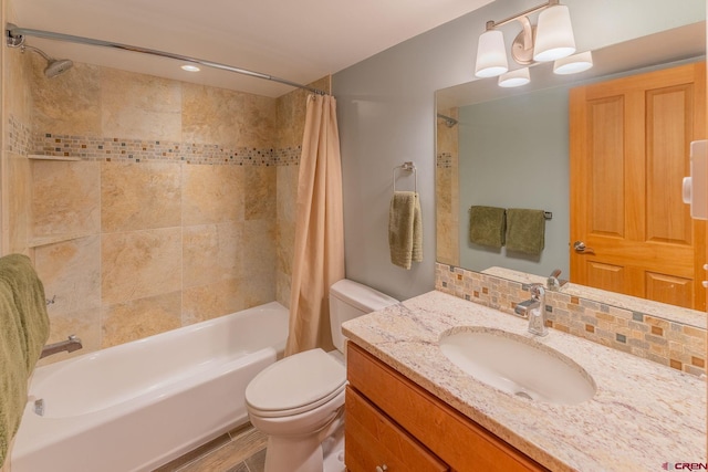 20 Hunter Hill Rd Unit 110, Mount Crested Butte, CO 81225 - full bath with shower / bathtub combination with curtain, vanity, and decorative backsplash