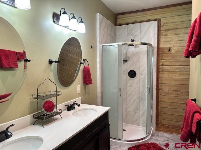115 S Linden, Cortez, CO 81321 - full bathroom with double vanity and a shower stall