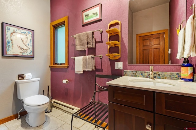 333 S Fir St Unit 101, Telluride, CO 81435 - bathroom with baseboard heating, vanity, and tile patterned floors