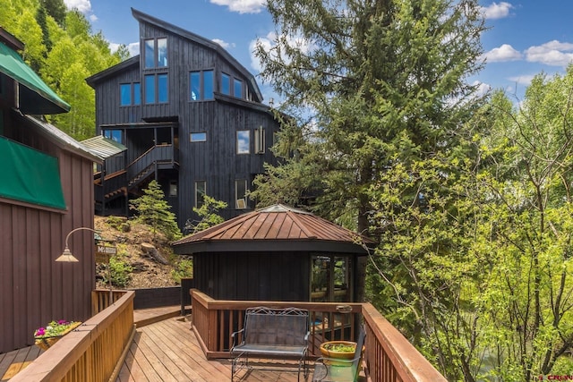 333 S Fir St Unit 101, Telluride, CO 81435 - rear view of property featuring a standing seam roof, a metal roof, and a wooden deck
