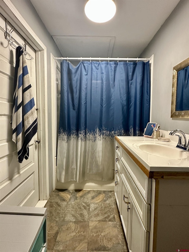 18551 F Rd, Delta, CO 81416 - full bathroom with vanity and shower / bath combo with shower curtain