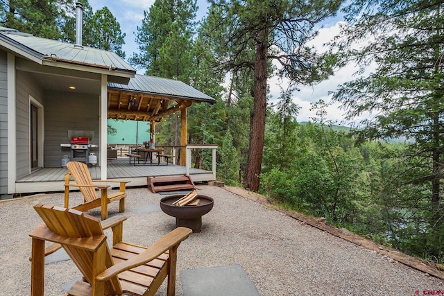 234 Wapiti Dr, Bayfield, CO 81122 - view of patio / terrace featuring a fire pit, a deck, and a grill