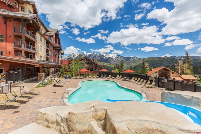 24 Sheol St Unit 202, Durango, CO 81301 - community pool featuring a mountain view and a patio area