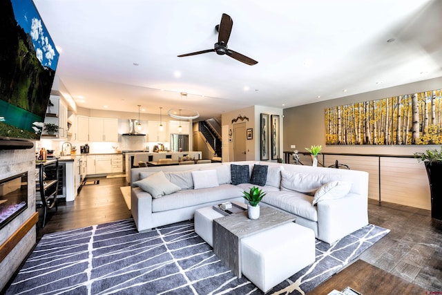 928 Twin Buttes Ave, Durango, CO 81301 - living room featuring stairway, a ceiling fan, dark wood-style floors, and recessed lighting
