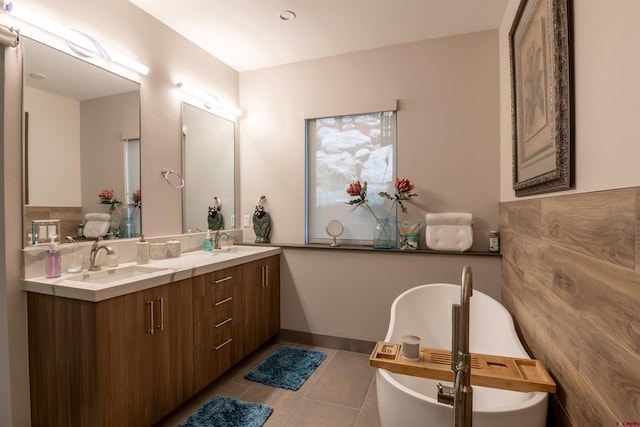 928 Twin Buttes Ave, Durango, CO 81301 - full bathroom featuring double vanity, tile patterned flooring, and a freestanding tub