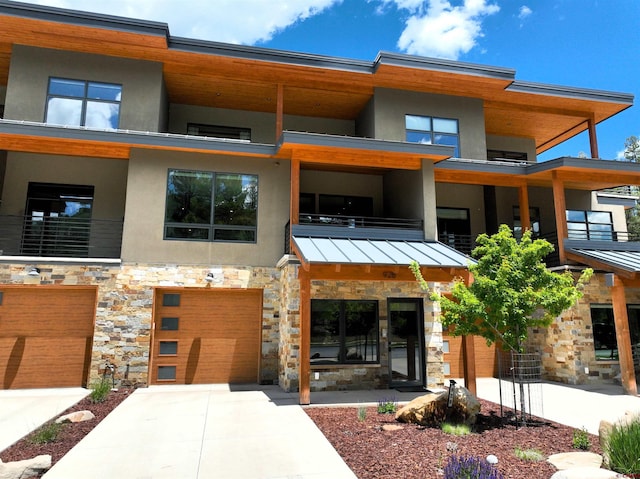 928 Twin Buttes Ave, Durango, CO 81301 - view of property with driveway and an attached garage