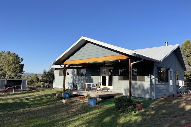 14245 Rd 21, Cortez, CO 81321 - rear view of house with a ceiling fan and a deck