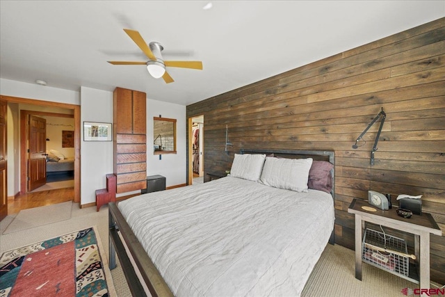 122 Juniper Rd, Ridgway, CO 81432 - bedroom featuring wooden walls and a ceiling fan
