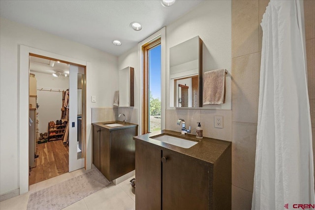 122 Juniper Rd, Ridgway, CO 81432 - bathroom with two vanities and tile patterned floors