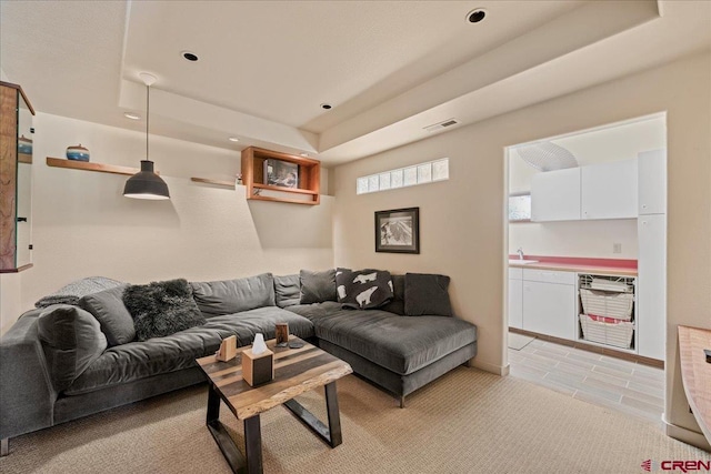 122 Juniper Rd, Ridgway, CO 81432 - living area with recessed lighting, a tray ceiling, and light tile patterned flooring