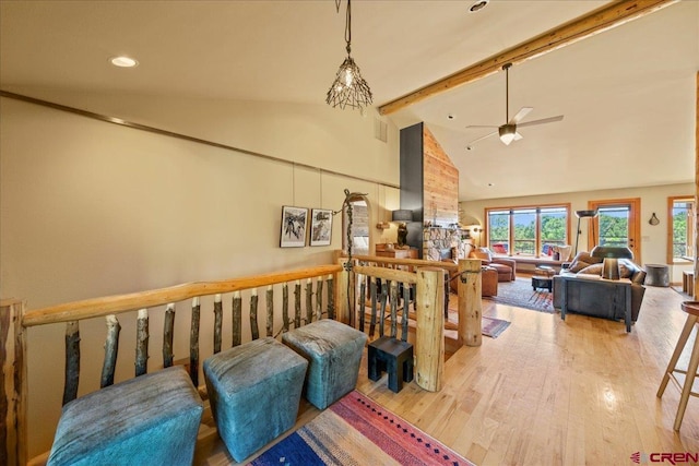 122 Juniper Rd, Ridgway, CO 81432 - living area featuring wood finished floors, beam ceiling, ceiling fan, high vaulted ceiling, and recessed lighting