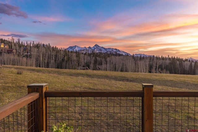 404 Benchmark Dr, Mountain Village, CO 81435 - view of mountain background with a heavily wooded area