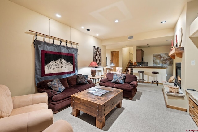 404 Benchmark Dr, Mountain Village, CO 81435 - living area featuring light carpet, recessed lighting, and a glass covered fireplace