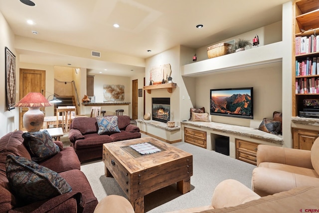 404 Benchmark Dr, Mountain Village, CO 81435 - carpeted living room with a fireplace and recessed lighting