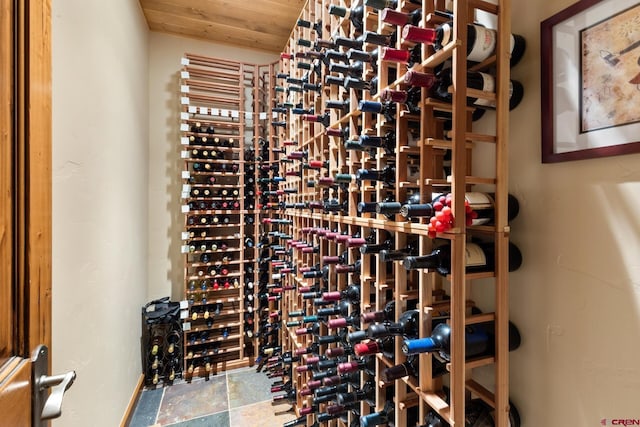 404 Benchmark Dr, Mountain Village, CO 81435 - wine room featuring stone finish floors and wood ceiling