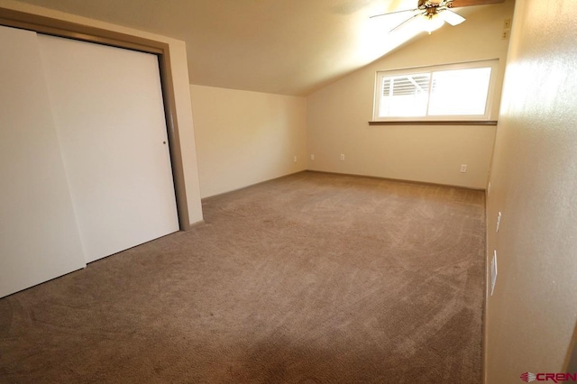 771 Aspen Dr, Cortez, CO 81321 - unfurnished bedroom featuring carpet, lofted ceiling, and a closet