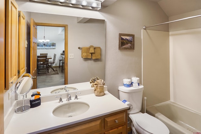50827 N 550th Hwy Unit 329, Durango, CO 81301 - bathroom featuring vanity, shower / tub combination, a chandelier, and wood finished floors