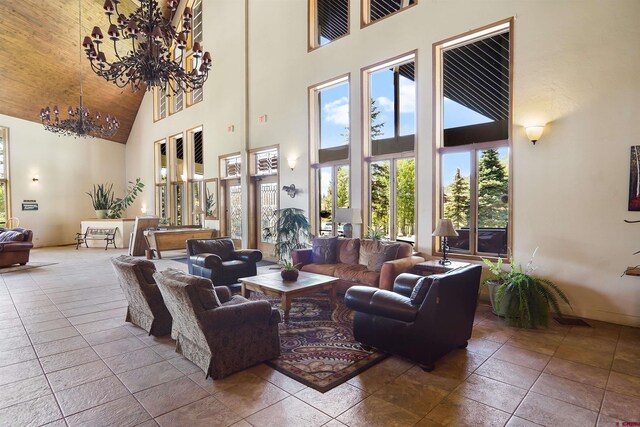 50827 N 550th Hwy Unit 329, Durango, CO 81301 - living area with high vaulted ceiling, a chandelier, and tile patterned floors