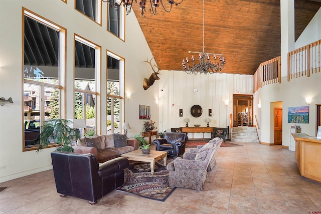 50827 N 550th Hwy Unit 329, Durango, CO 81301 - living area featuring high vaulted ceiling, a chandelier, wood ceiling, and tile patterned flooring