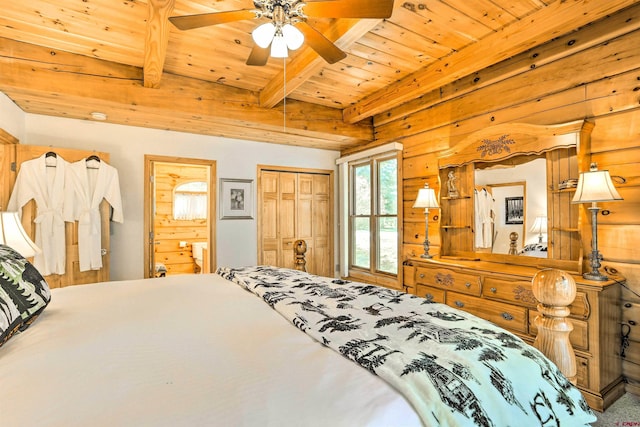 601 W Grimes Creek Rd, Bayfield, CO 81122 - bedroom with a wooden ceiling with exposed beams, wooden walls, and ensuite bathroom