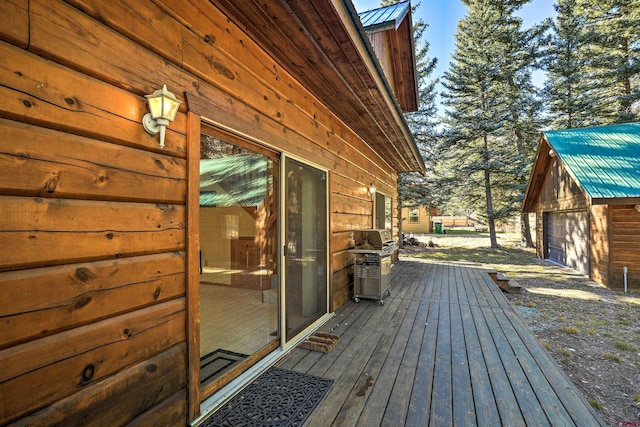 601 W Grimes Creek Rd, Bayfield, CO 81122 - deck with a detached garage, an outbuilding, and area for grilling
