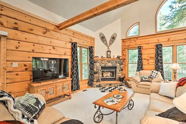 601 W Grimes Creek Rd, Bayfield, CO 81122 - carpeted living area featuring beamed ceiling, high vaulted ceiling, wooden walls, and a fireplace