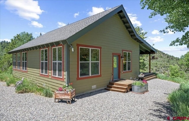 444 Which Way, Ridgway, CO 81432 - rear view of house with roof with shingles and crawl space
