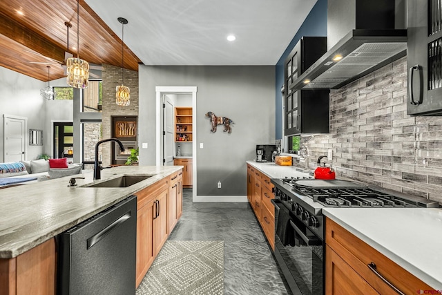 2161 Scout Ridge Rd, Durango, CO 81301 - kitchen featuring stainless steel dishwasher, gas stove, wall chimney range hood, tasteful backsplash, and light countertops