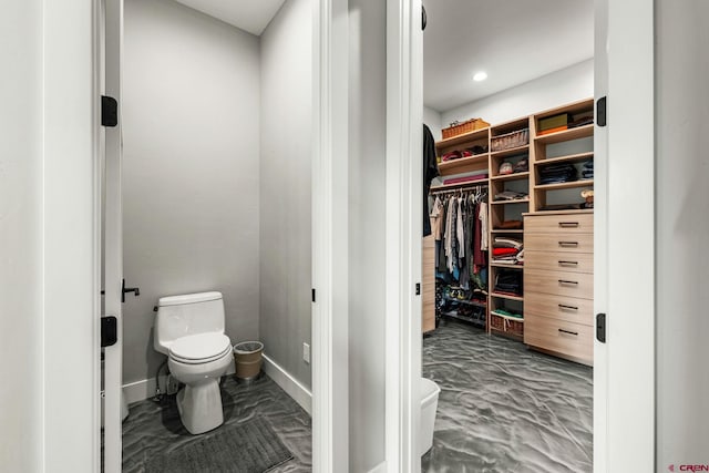 2161 Scout Ridge Rd, Durango, CO 81301 - bathroom featuring toilet and a walk in closet