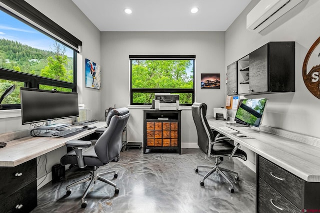 2161 Scout Ridge Rd, Durango, CO 81301 - office featuring a wall mounted air conditioner, healthy amount of natural light, concrete flooring, and recessed lighting