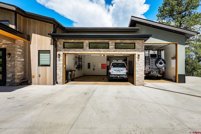 2161 Scout Ridge Rd, Durango, CO 81301 - garage featuring concrete driveway