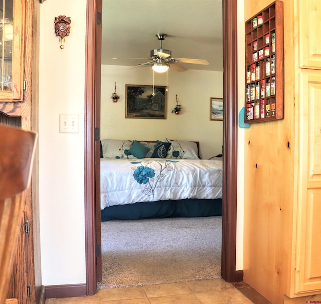 521 Alta Lakes Ave, Montrose, CO 81403 - tiled bedroom with carpet floors