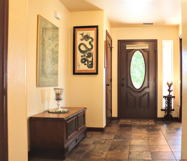 521 Alta Lakes Ave, Montrose, CO 81403 - foyer entrance featuring baseboards