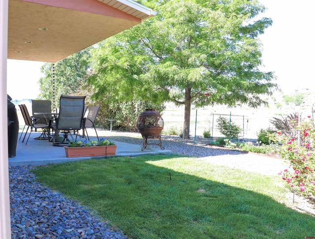 521 Alta Lakes Ave, Montrose, CO 81403 - view of yard with a patio and outdoor dining area