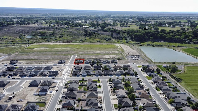 521 Alta Lakes Ave, Montrose, CO 81403 - view of property location with a large body of water and nearby suburban area